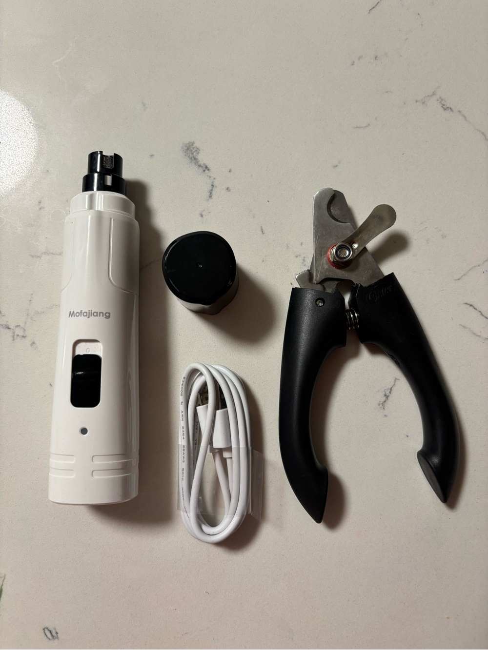 White Rechargeable Pet Nail Grinder with Black Nail Trimmer